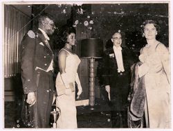 Two couples stand together