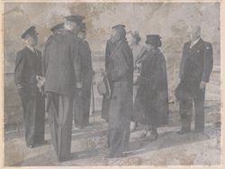 The officers of the "De Ruyter" being presented to the President, Mrs. Tubman and the Queen, by Commander of cruiser, Captain Royal G. J. Platerink whilst Defense Minister Staf looks on