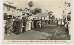 Crowd waves during parade