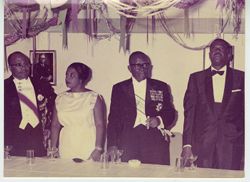 President Tubman and guests standing at  reception table