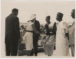Dignitaries standing and greeting each other