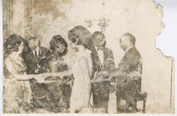 Guests greet each other at a formal event
