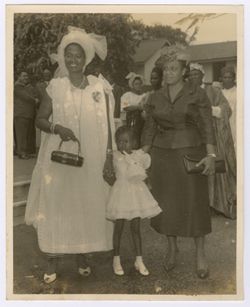 Woman and young girl pose with Mrs. Tubman
