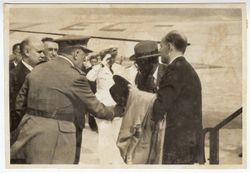 President Tubman shakes hands with a Spanish official upon his arrival at the airport