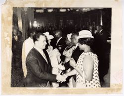 Group shakes hands