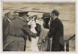 President Tubman shakes hands with a Spanish official upon his arrival at the airport