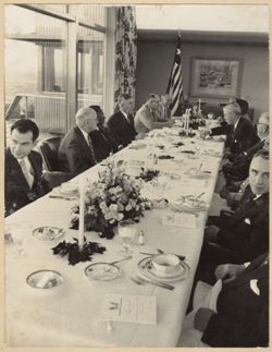 President William V. S. Tubman seated with officials during a meeting