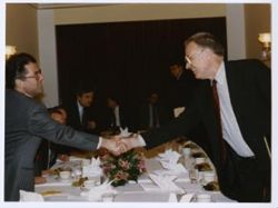President Fischer shaking hands
