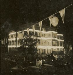 Exterior shot of Executive Mansion lit up at night