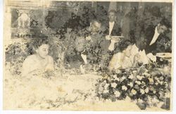 President William V. S. Tubman sits with guests at a formal reception