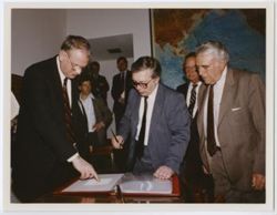 Ambassador Lukin signs a book