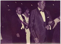 Women and men in formal attire