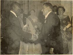 Edward van Beinum, conductor of Concertgebow Orchestra, being presented to President William V. S. Tubman