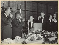President William V. S. Tubman toasts with Lee R. Jackson, Harvey S. Firestone Jr. and other Firestone officials