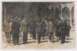 President Tubman accompanied by Spanish military officials and Liberian dignitaries on a tour of the Alcazar in Toledo, Spain