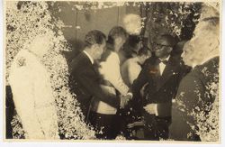 President William V. S. Tubman greets men in receiving line during formal event