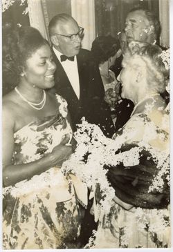 Guests mingle at a formal reception