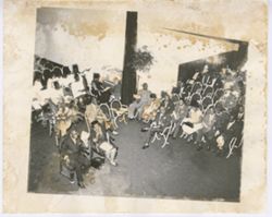 Crowd seated in audience