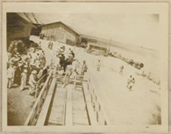 View of inspection group entering the railroad cars preparatory to visiting docksite and jetties.