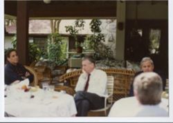 Ten-person gathering around tables, #8