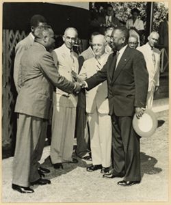 President William V. S. Tubman greets man on visit