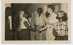 Workers greet Mrs. Antointette Tubman