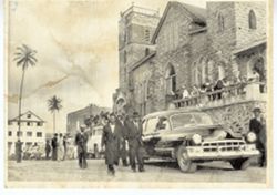 Exterior picture of church and funeral procession