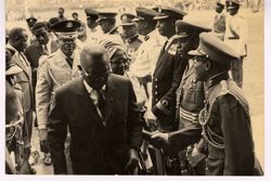 President William V. S. Tubman  greets millitary officers
