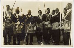 Vice President William Richard Tolbert, Jr., and Richard Henries, pose with other officials dressed in formal ceremonial attire
