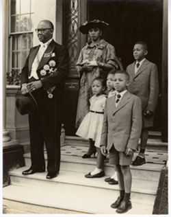 Ambassador and Mrs. Brewer and children pose for portrait