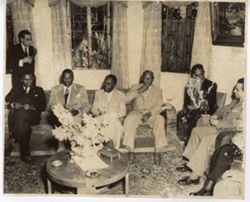 President William V. S. Tubman and officials seated at reception