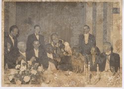 President and Mrs. Tubman serenaded by musician at formal dinner