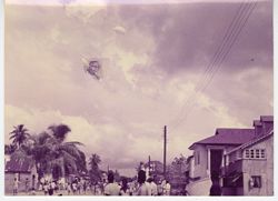 Kite bearing image of President Tubman in flight