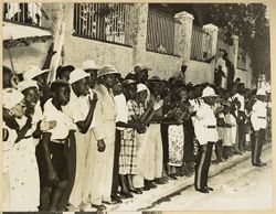 Crowd cheers from road side during presidential welcoming