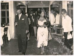 President and Mrs. Tubman enter the dining room of the "Transatlantico" in Bari to attend a dinner in the President's honor