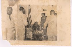 Small group sitting and standing together