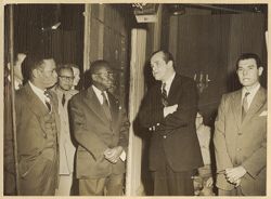 President William V. S. Tubman and others stand together