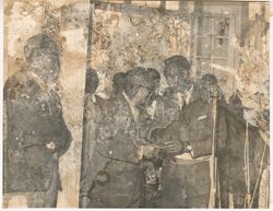 President Tubman receives a package from unidentified man
