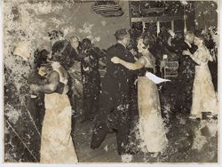 Couples dance during a reception