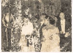 President William V. S. Tubman, Mrs. Tubman and dignitaries observing artifacts