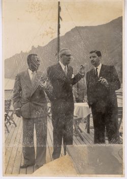 President Tubman and companions standing on deck of ship