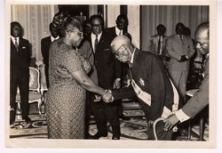Mrs. Tubman greets dignitaries in a recieving line