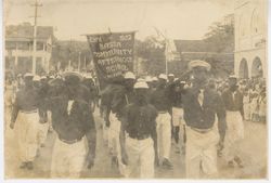 Group of young men from Bassa Community Afternoon School march in parade