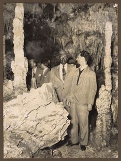 Dignitaries in a cave