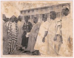 President William V. S. Tubman talks with a group of dignitaries