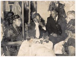 President and Mrs. Tubman seated with dignitaries