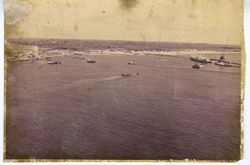 Aerial view of coastline, boats and harbor