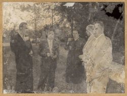 Guests talk to General Francisco Franco at a reception