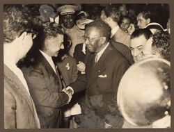 President William V. S. Tubman in a friendly chat with dignitary