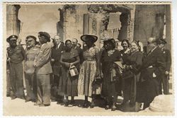 President Tubman tours the damaged Alcazar with his wife and other dignitaries in Toledo, Spain